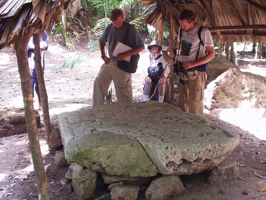 Examining Stelea - El Peru  Photo Gallery - Maya Expeditions