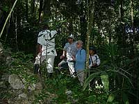 Enrique Salazar explaining to group - El  Mirador